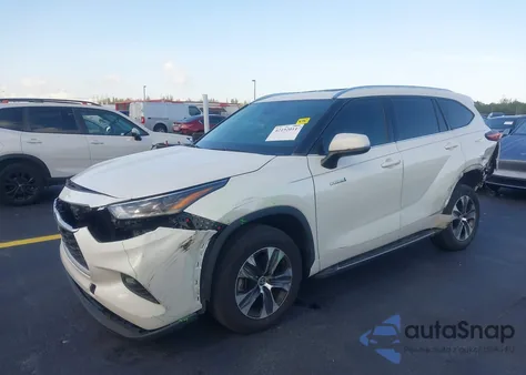 2021 Toyota Highlander Hybrid Xle z USA, uszkodzony, nr VIN 5TDGARAH3MS506073